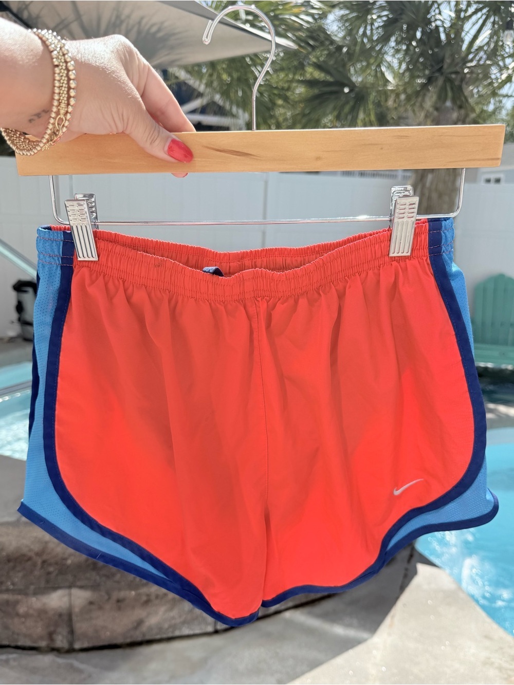 Nike Women's Coral Red Athletic Shorts with Blue Trim